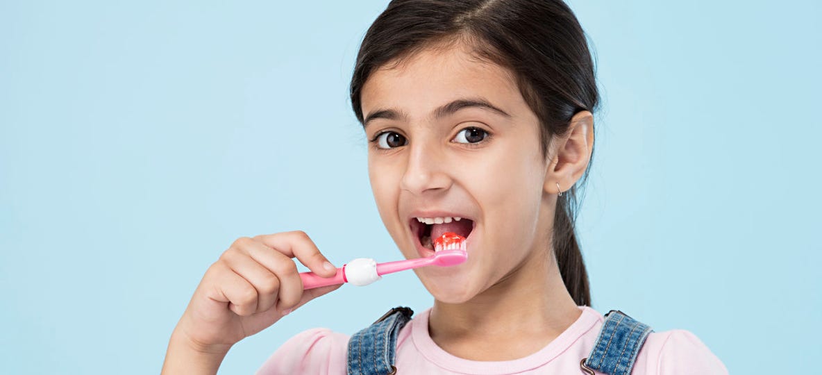 Oral Care - child with happy denture